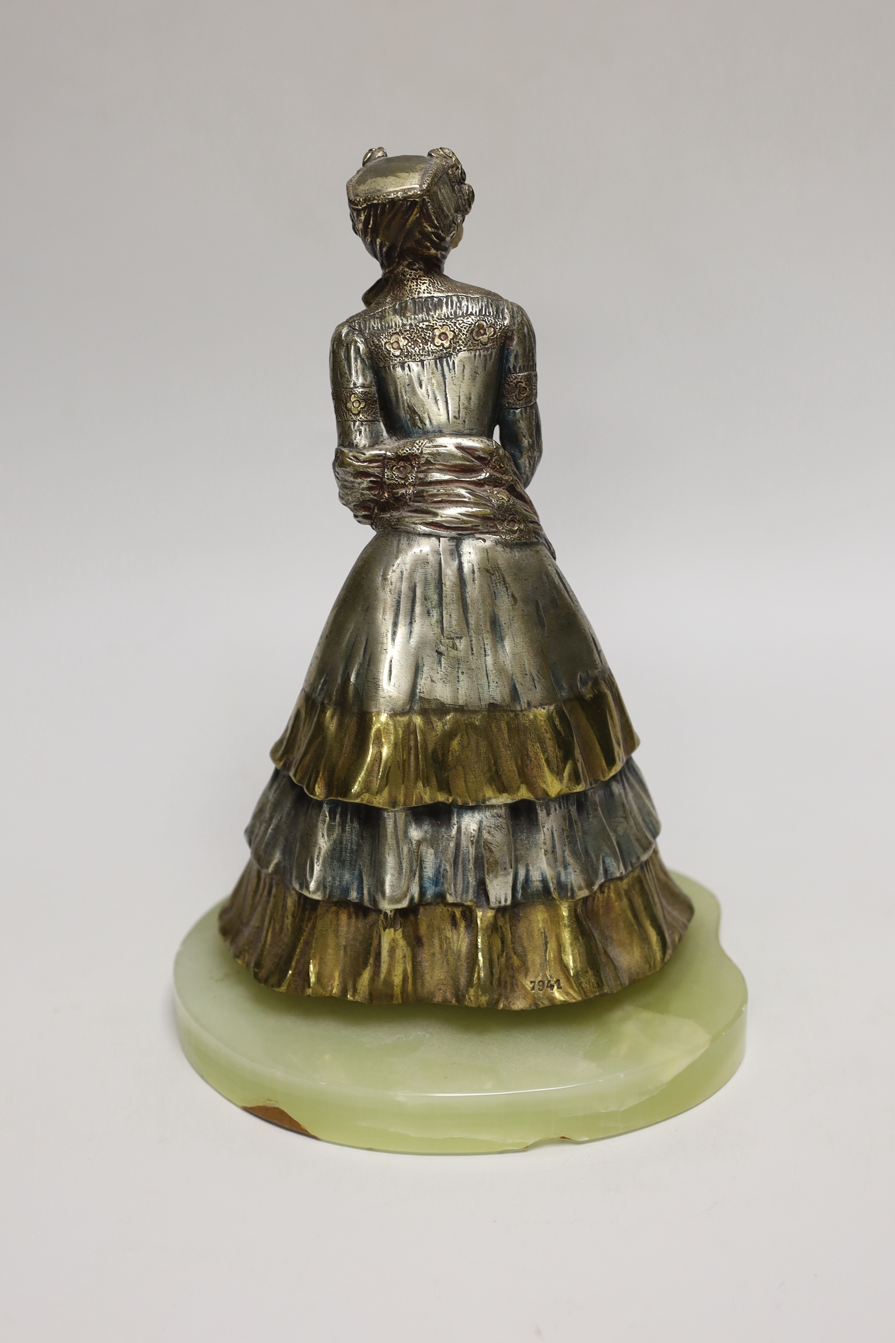 After Rene-Paul Marquet (French, 1875-1939). A bronze and ivory figure of a lady, on onyx plinth, 24cm